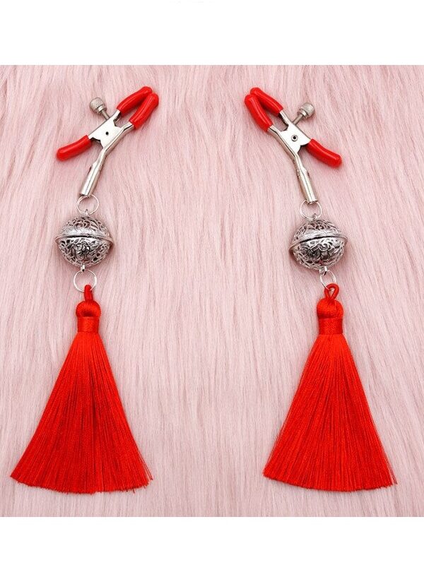 Mellbimbó szorítók piros dísszel.