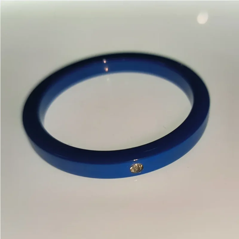 Alumínium köves kék péniszgyűrű. Átmérő:50mm